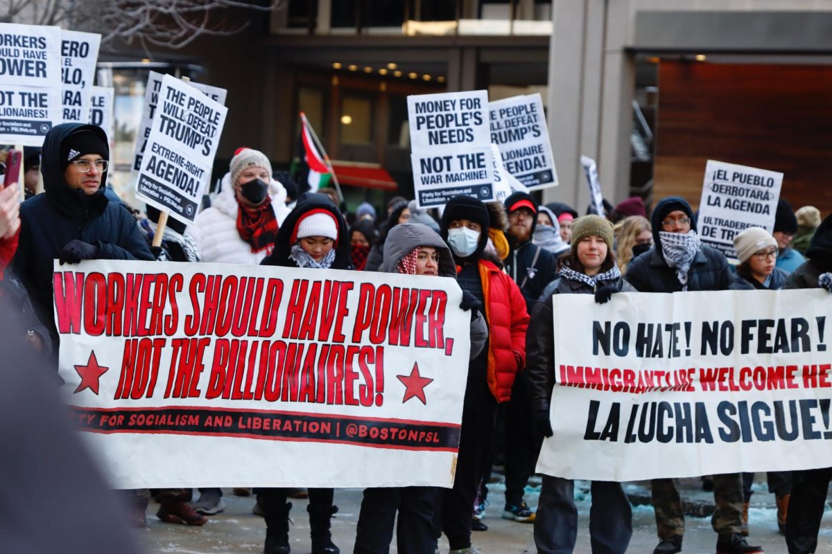 The Boston chapter of the Party for Socialism and Liberation (PSL) holds a rally against the Trump administration outside the JFK Federal Building Monday afternoon. (Arthur Mansavage/Beacon Staff)