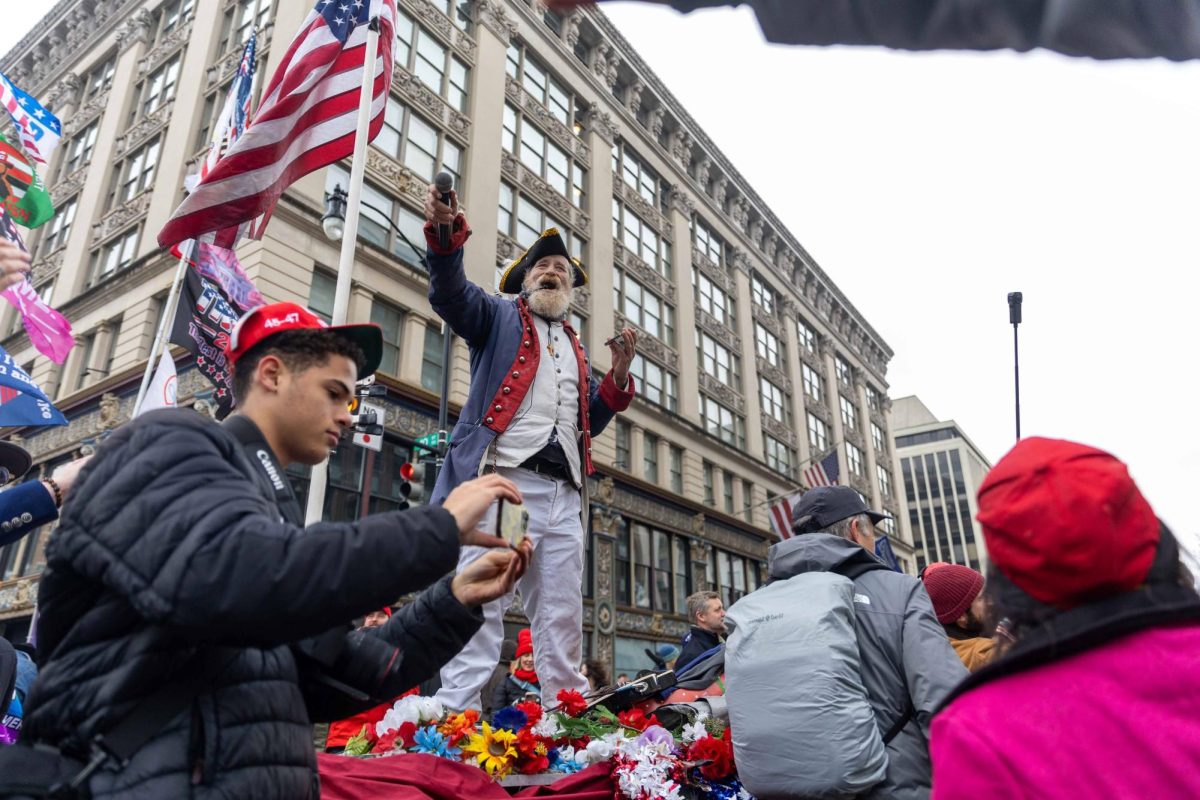 Thousands of Trump supporters gathered outside of Capital One Arena in downtown Washington, D.C. on Sunday, Jan. 19, 2025 as trump gave his inauguration-eve speech.(Rian Nelson/ Beacon Staff)