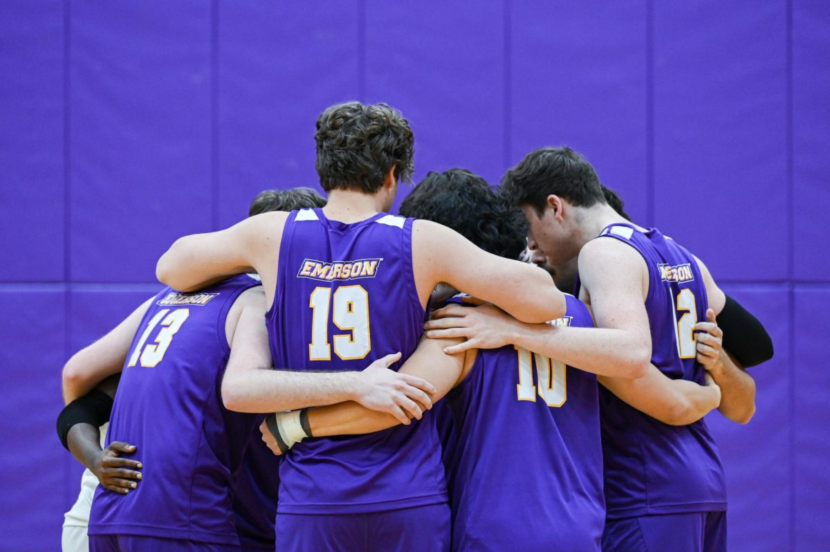 The Emerson men's volleyball team huddles up prior to their match against Endicott on Feb. 4, 2025 (Courtesy of Anna Schoenmann).