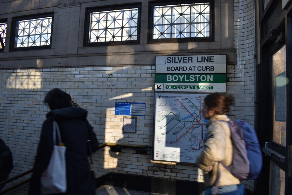 Commuters enter the MBTA Boylston Greenline station on Feb. 21, 2025. (Madalyn Jimiera/ Beacon Staff)