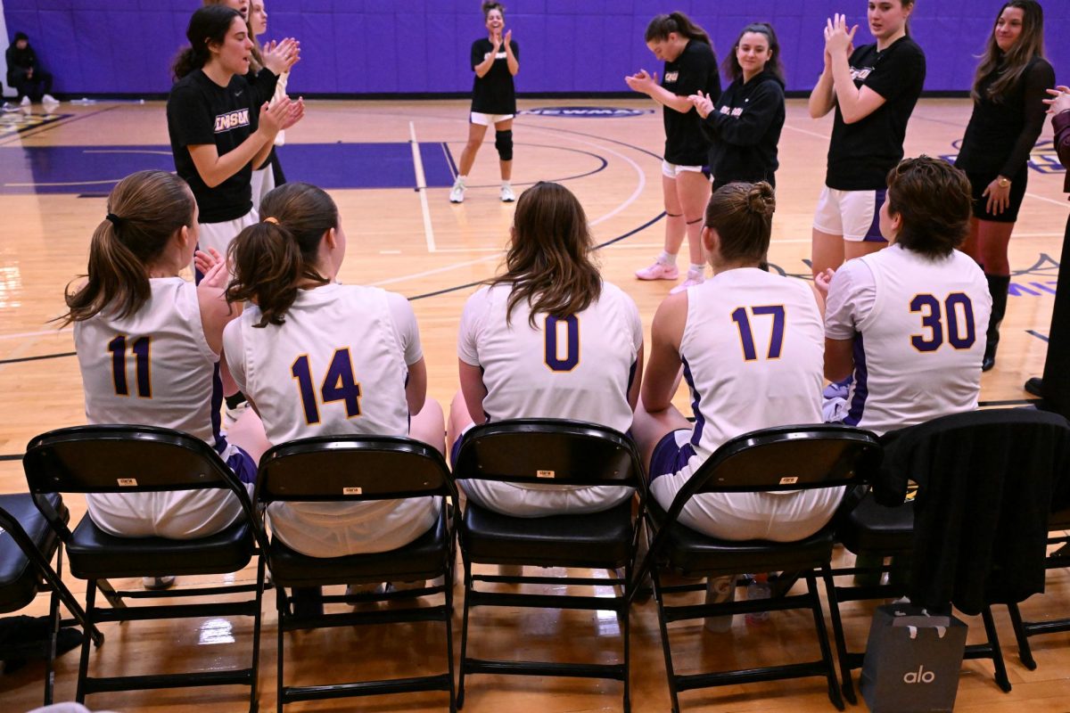 The starters for Emerson women's basketball ahead of their game against Wheaton on Feb. 15, 2025. From left to right: Kendra Dodd, Kaylin O'Meara, Elise Arnold, Claire English and Jessie Silk (Riley Goldman/ Beacon Staff).