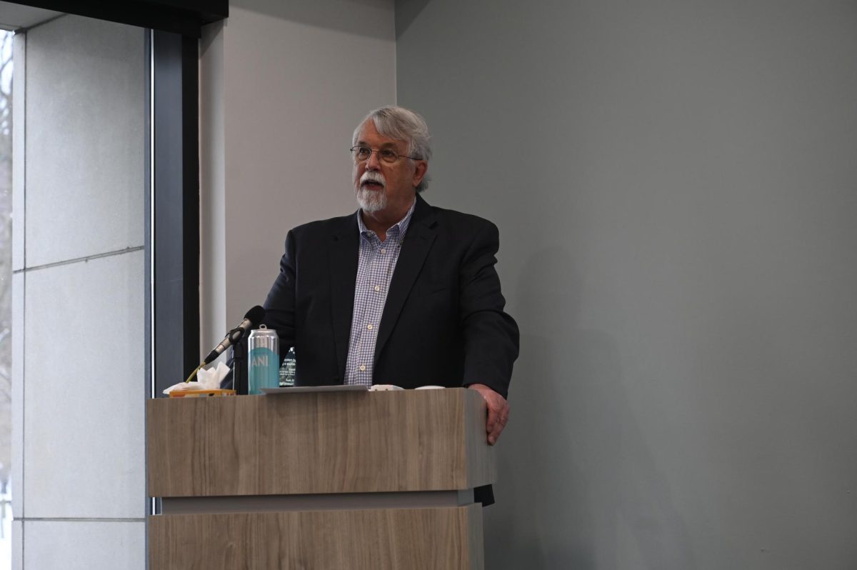 Richard Iandoli gives a presentation on past and present LGBTQ+ migration policies (Hannah Brueske/ Beacon Staff). 