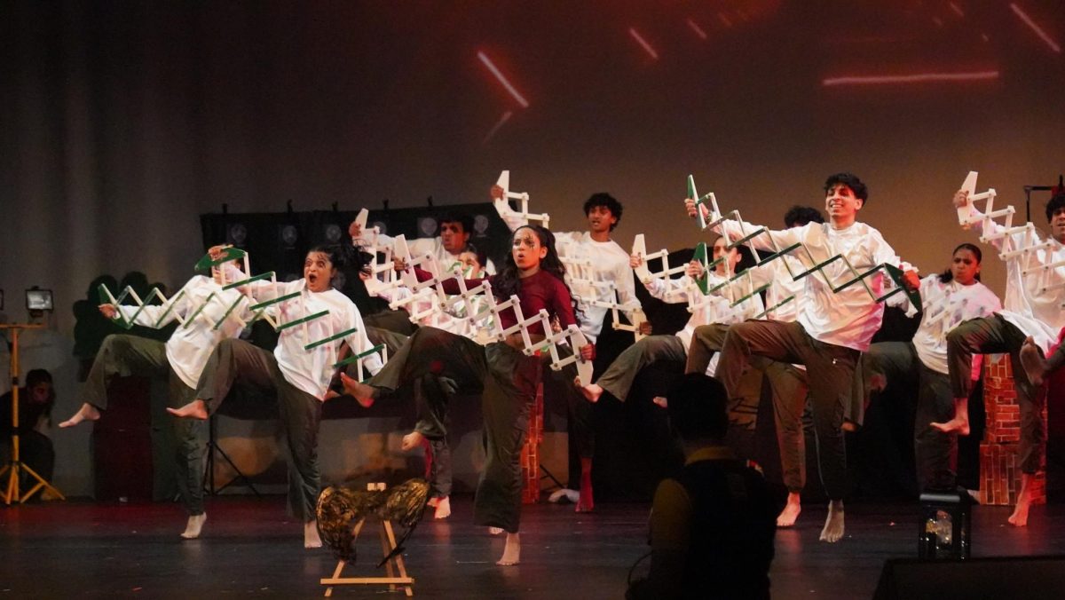 UConn's Surya performs a routine inspired by the "Hunger Games" franchise. (Ryan Yau / Beacon Staff)