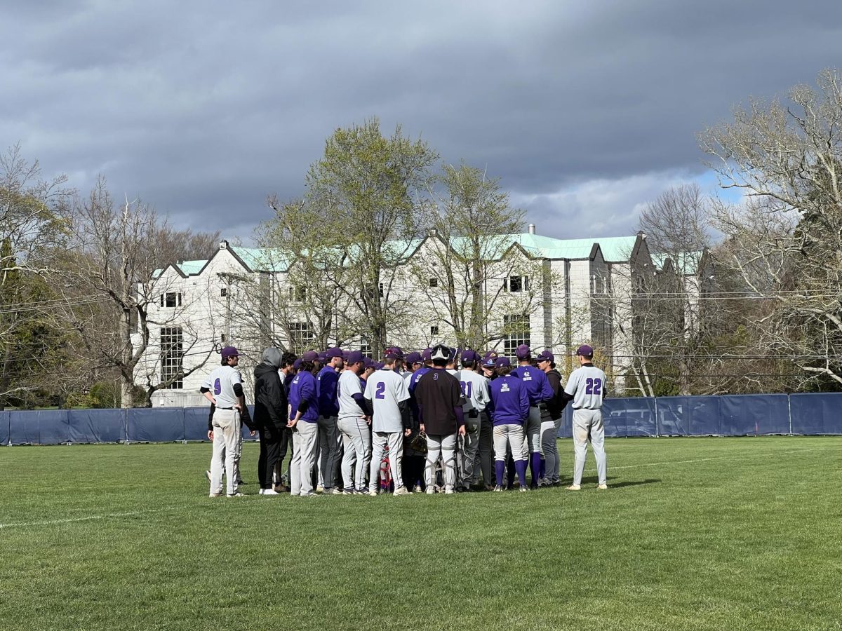 The Emerson baseball team following their doubleheader losses against Salve Regina on April 27, 2025 (Jordan Pagkalinawan/ Beacon Staff).