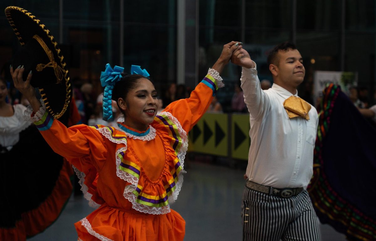 Yamileth Paz (Left) dancing with Paul Alcántar (Right) during the Veronica Robles Cultural Center (VROCC)’s performance of “A Dance Journey through Latin America” on Thursday September, 19 2025. (Alex Cuozzo/For The Beacon)