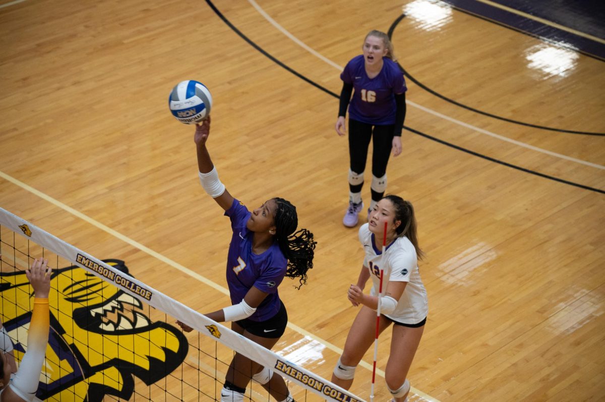 First-year outside hitter Dalena Garrett (#7) goes for an attack against Wentworth Institute of Technology on Sept. 13, 2025 (Riley Goldman/ Beacon Staff).