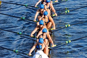 Rowers on the water during a race Sunday morning at the Head of The Charles Regatta. (Arthur Mansavage/ Beacon Staff)