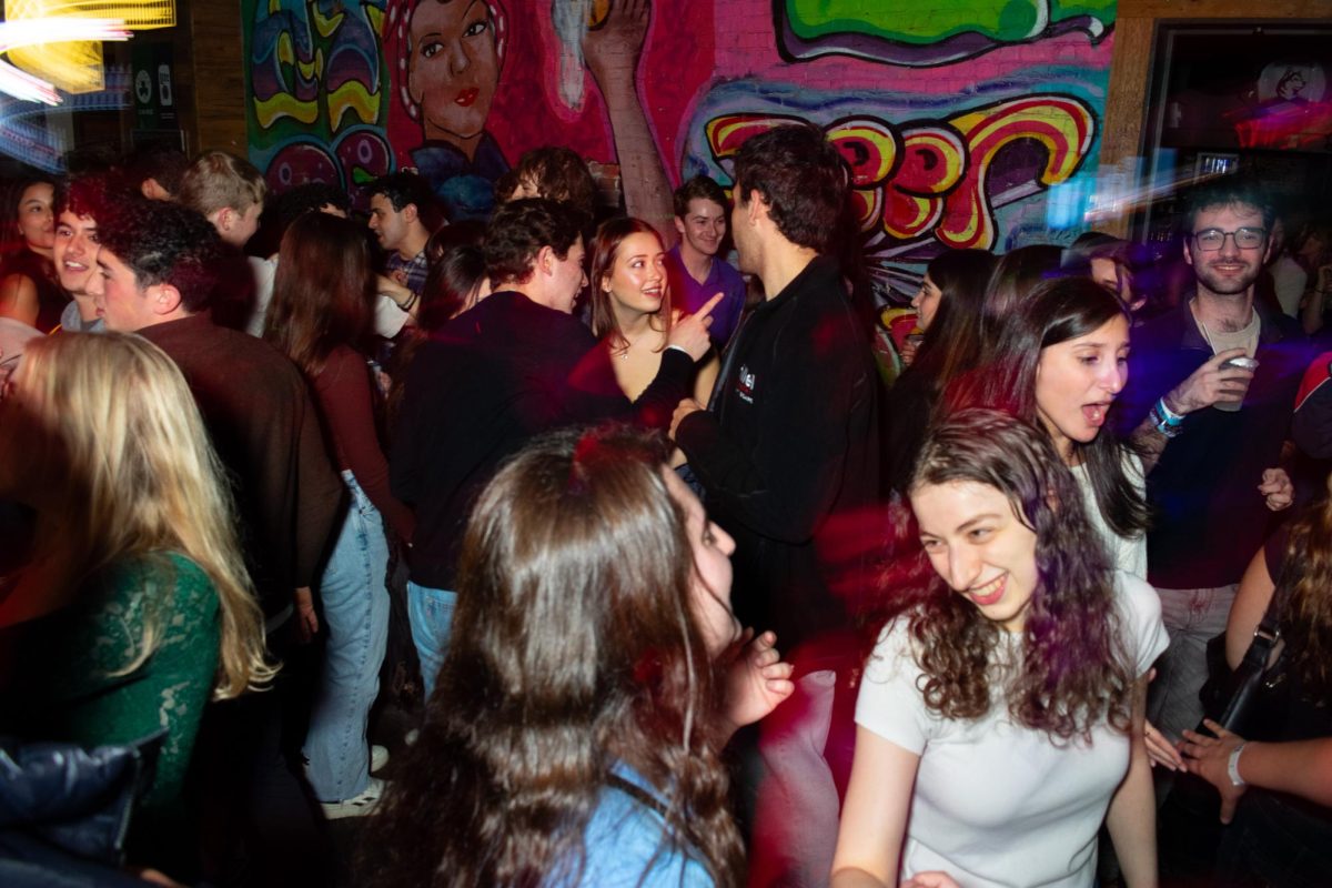 Attendees of Hanukkah Palooza pack the Two Saints Tavern near Northeastern University in Boston. (Courtesy / Joe Frank for Hillel Council of New England)