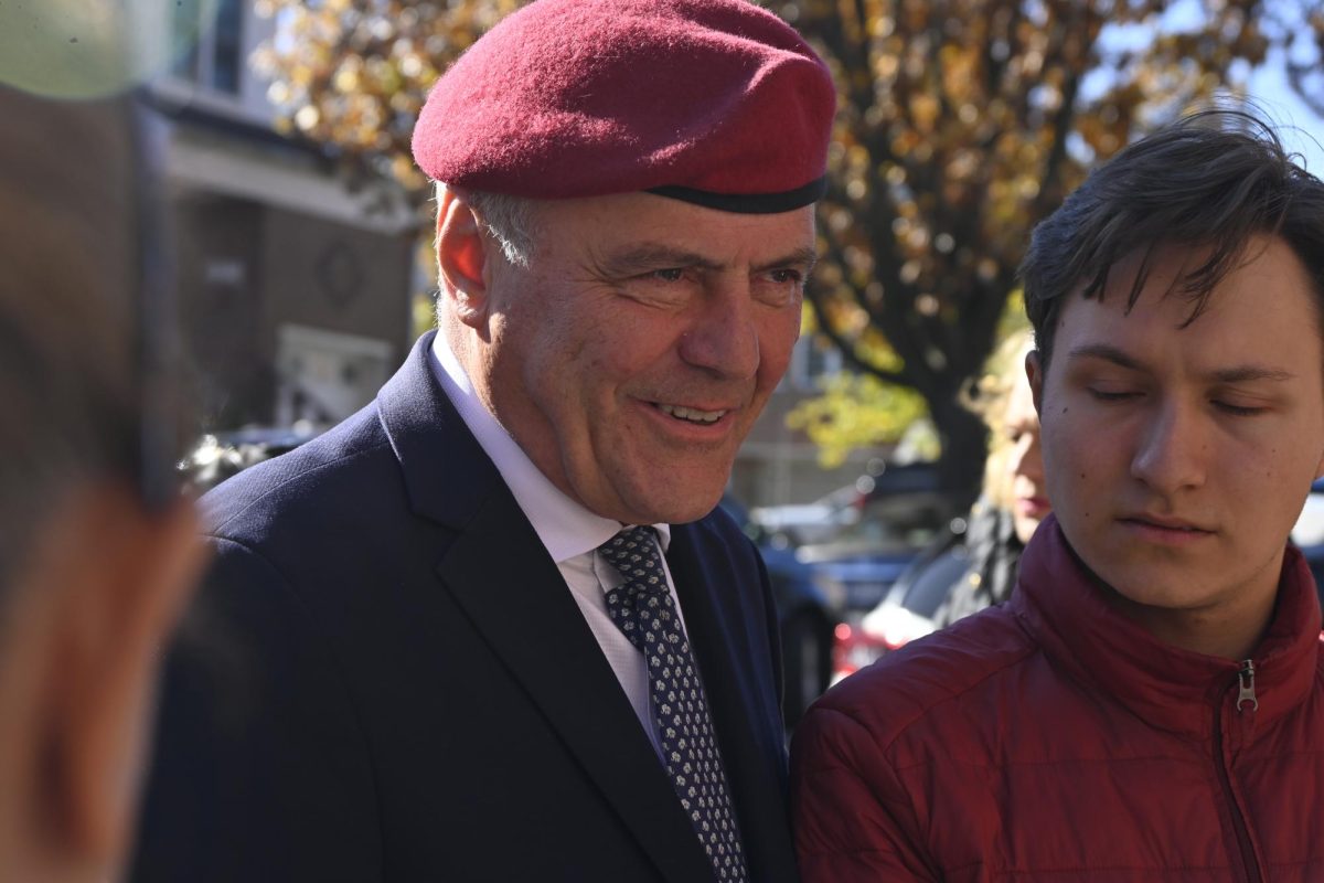 Republican candidate for NYC mayor Curtis Sliwa meets with voters outside polling location in Queens.