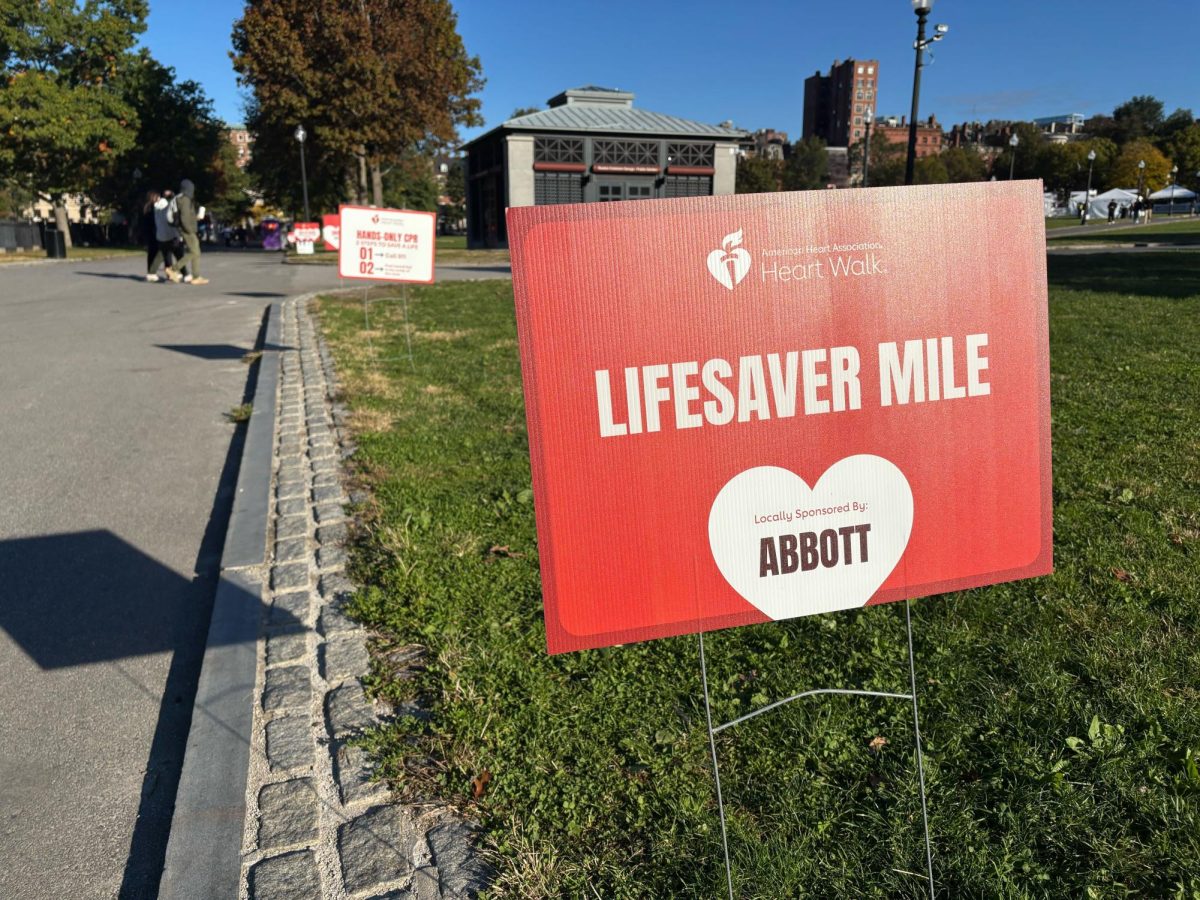 Signs directed walk participants in a lap around the Boston Common in honor of lives lost to heart disease on Sunday, Oct. 26, 2025. (Hannah Goeke / Beacon Staff)