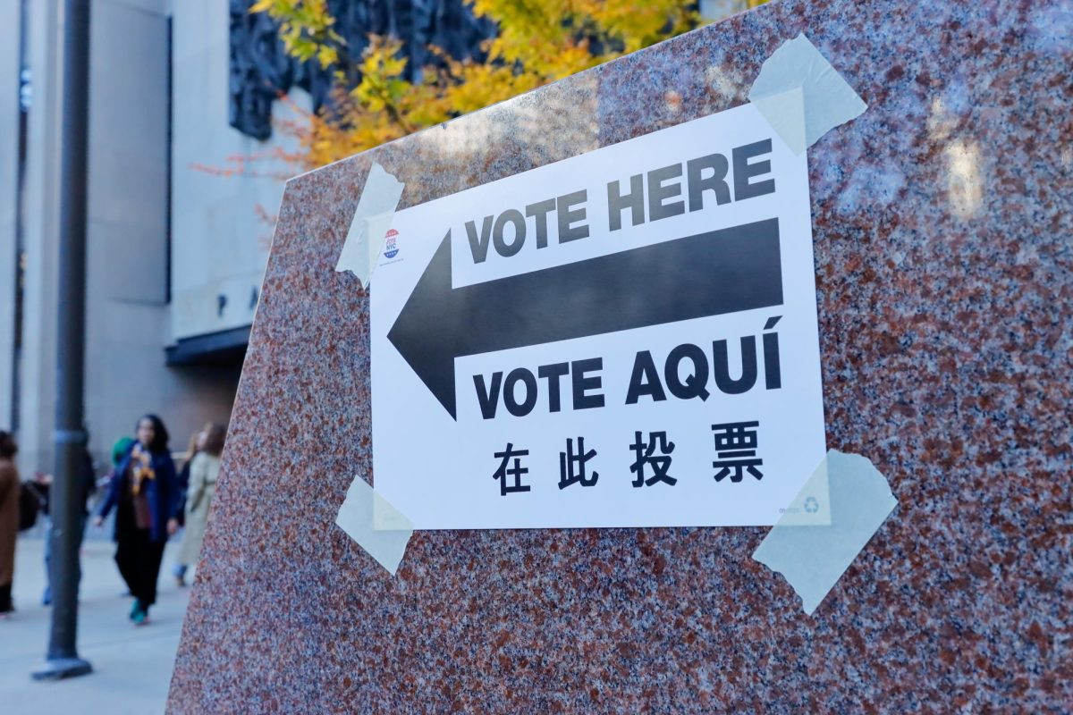 Signage showing where a polling place is. (Arthur Mansavage/ Beacon Staff)