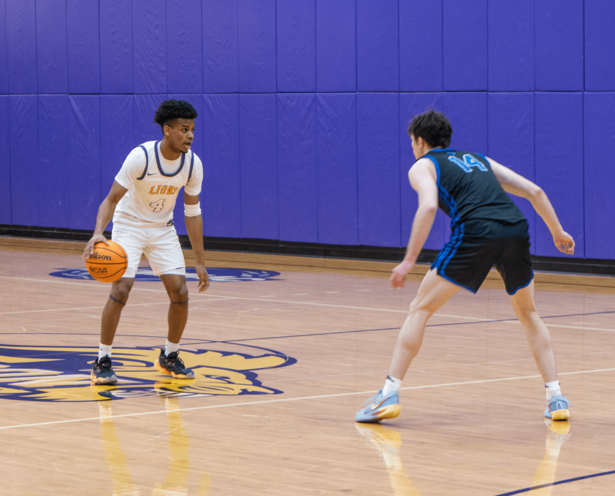 Junior guard BJ McNeil against the Wheaton College Lyons on Dec. 6, 2025 (Jacob Goldberg/ Beacon Staff).