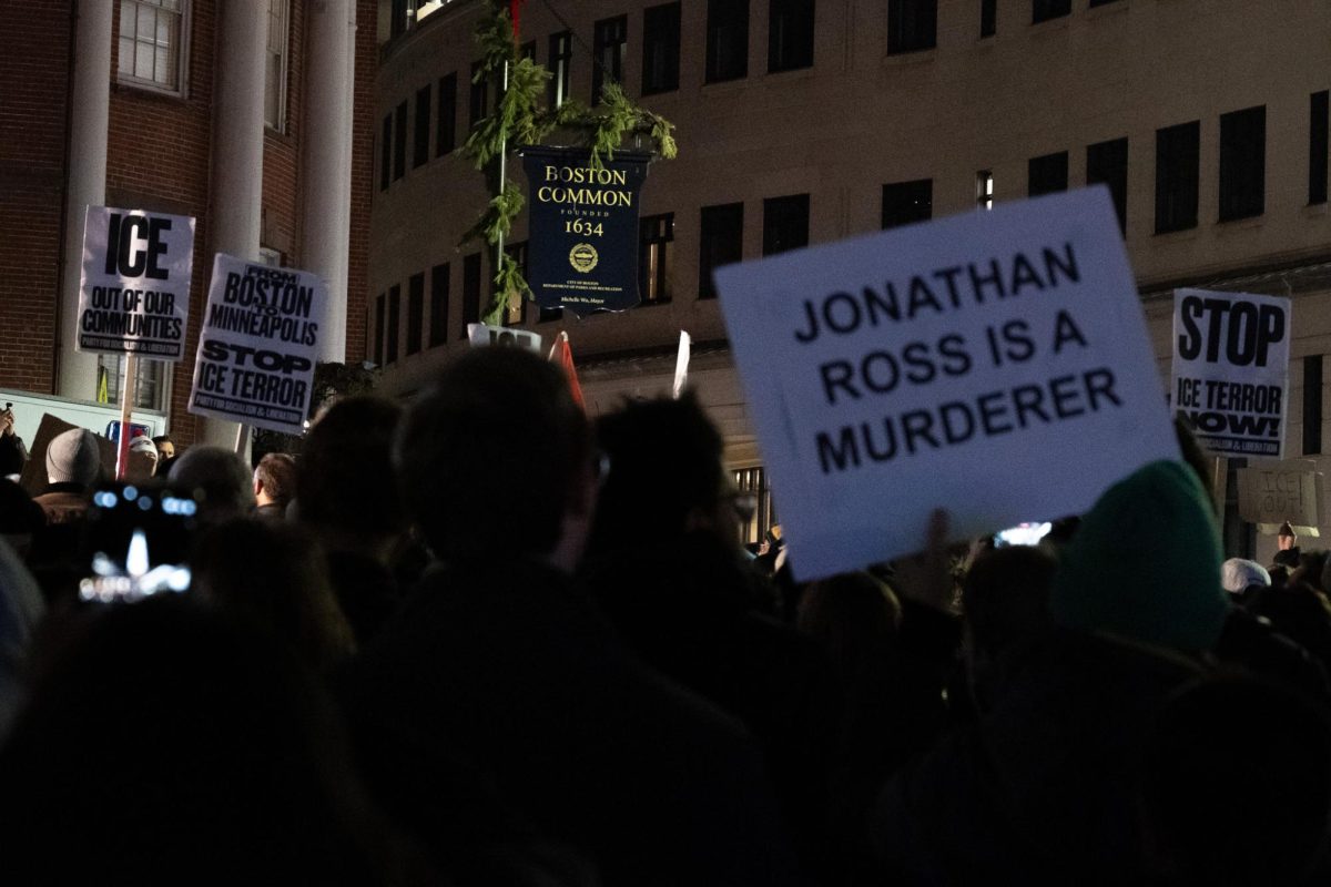Demonstrators brought various homemade signs. (Nick Peace/ Beacon Staff)