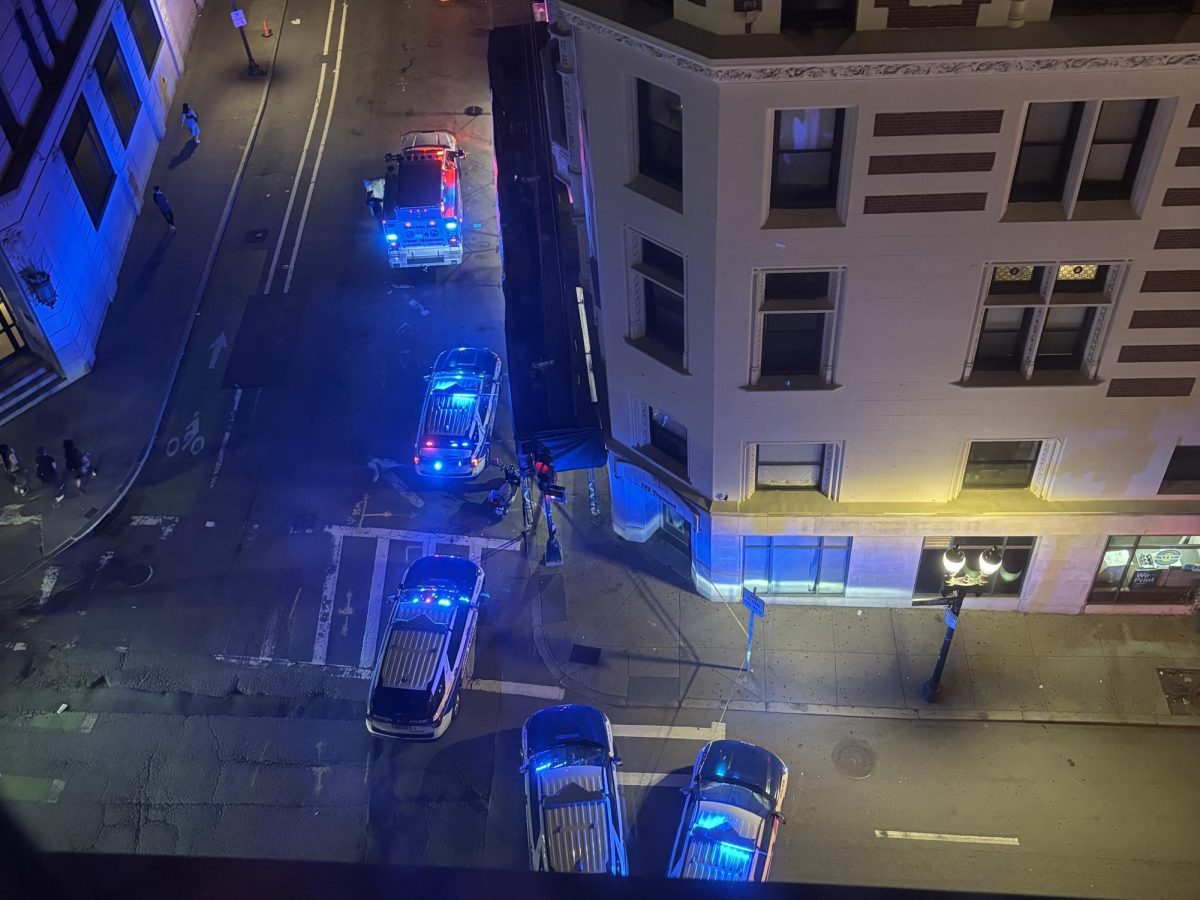 Police cars blocked off Tremont Street after a shooting outside of the Union Bank Building on June 29, 2026 (Mer Hughes/ Beacon Staff)
